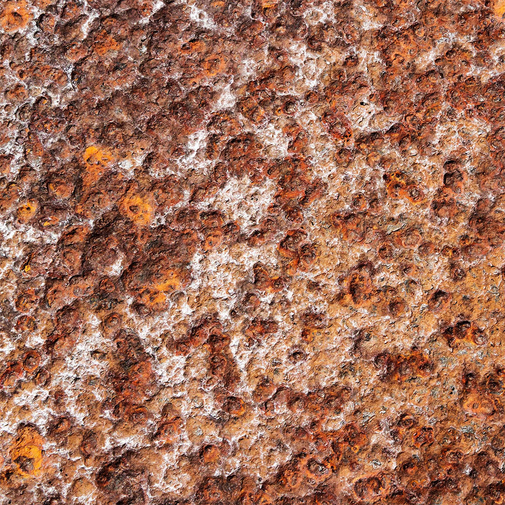 pitting corrosion on worn metal plate