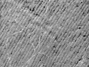 Armoloy Electrolizing microcracked thin dense chrome on surface at 500 magnification