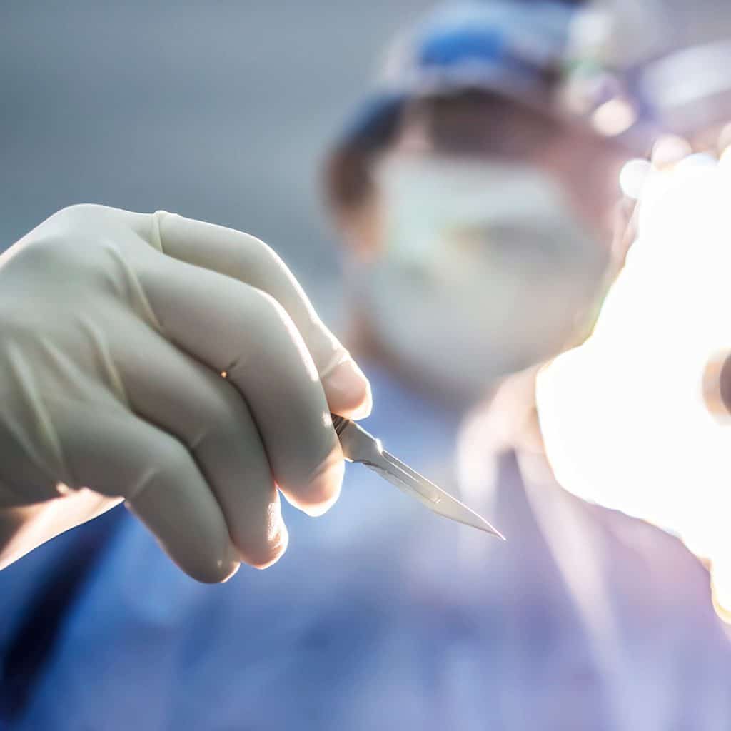medical surgeon with scalpel