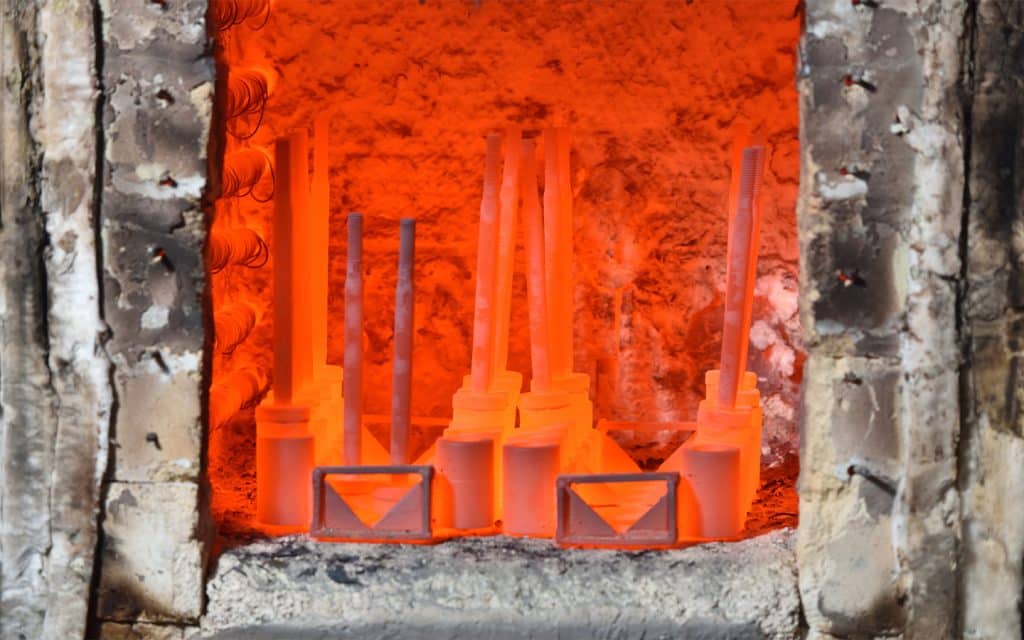 metal treating process of hardening in an electric furnace