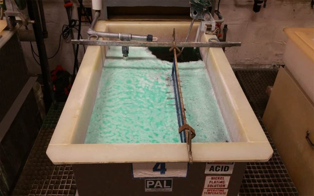 Armoloy electroless metal treating bath