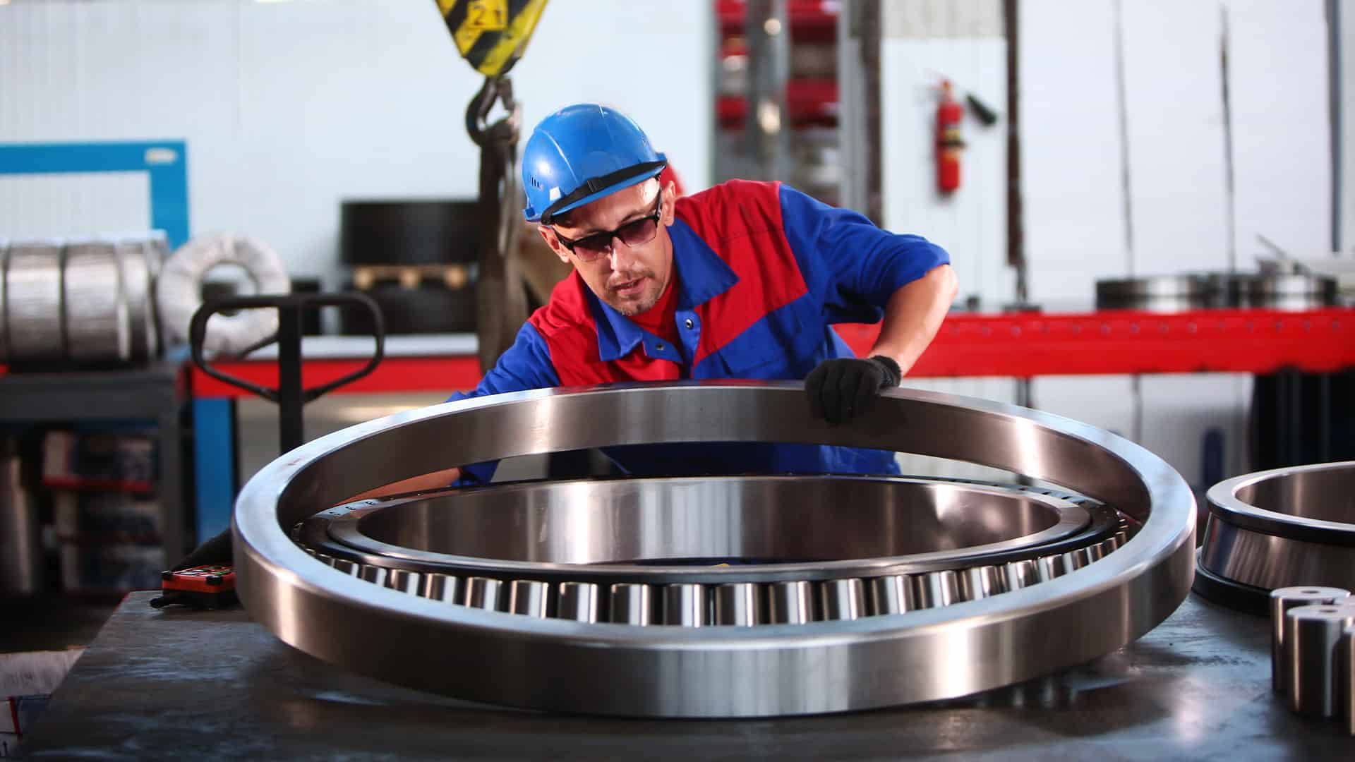 massive roller bearing being assembled after Armoloy coating