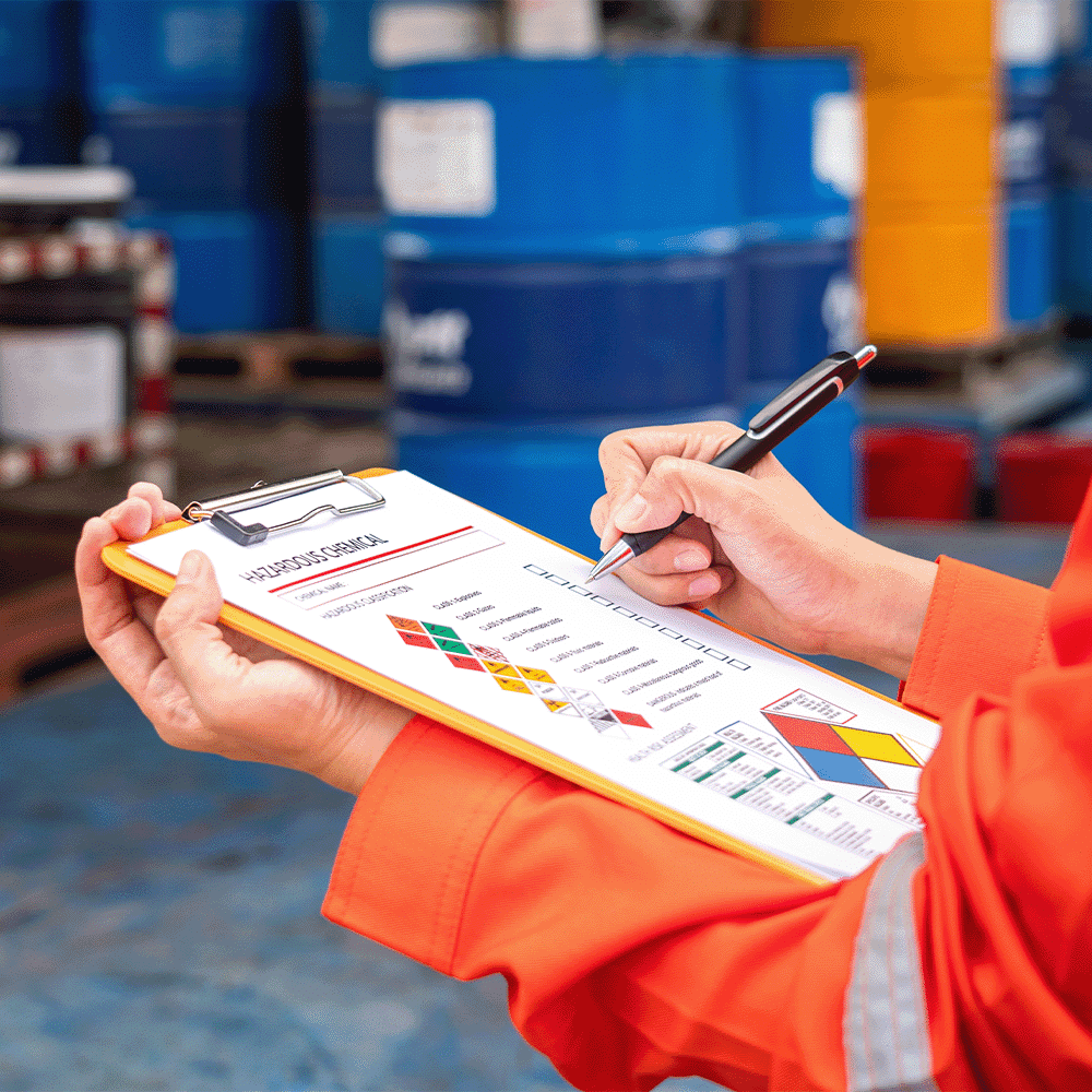 REACH compliance inspector holding hazardous materials checklist
