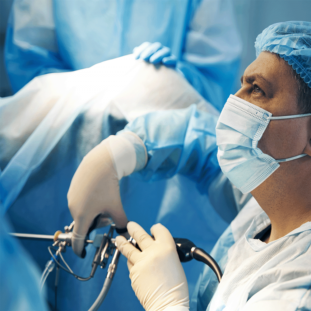 surgeon operating with NAMSA tested laparoscopic tool