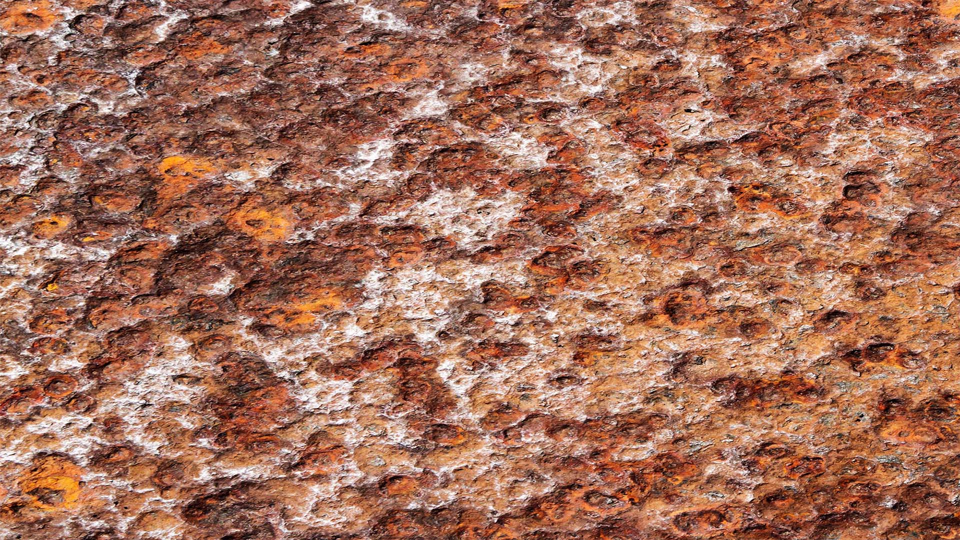 severe state of pitting corrosion seen on metal surface