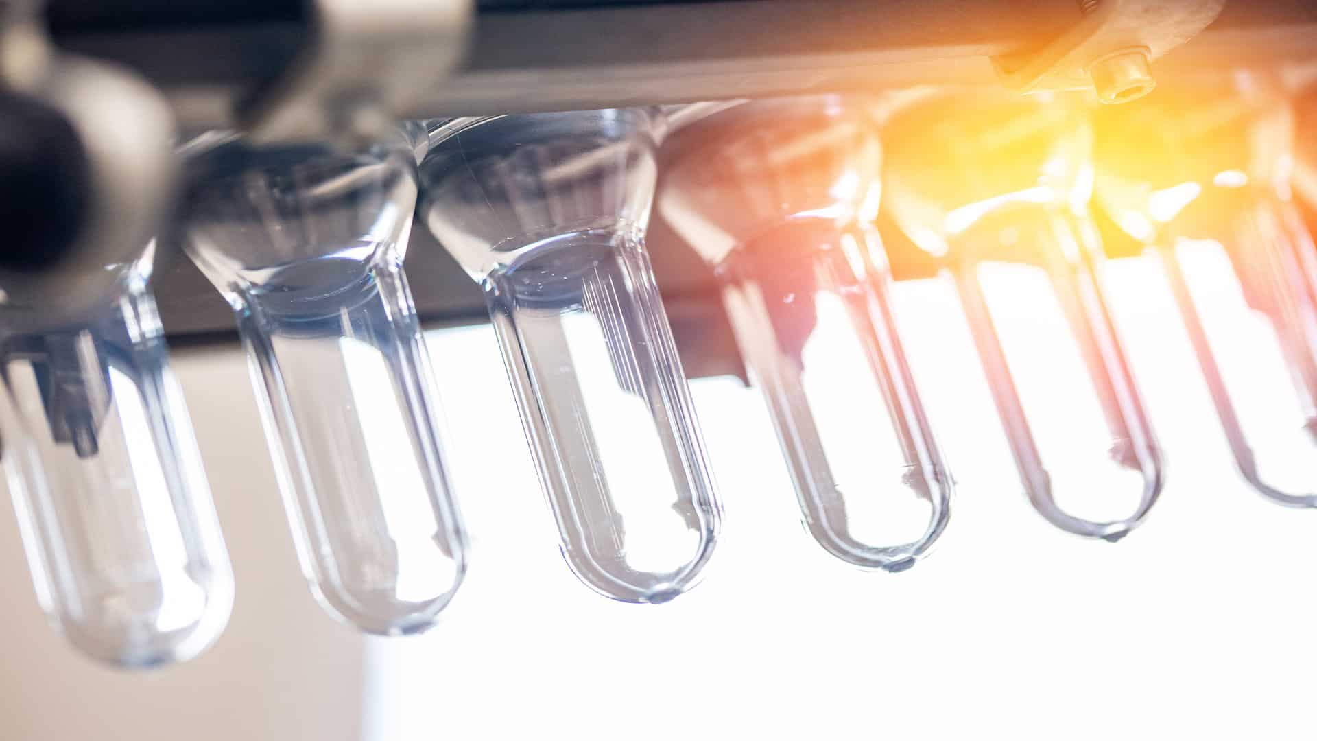 close up of rotary wheel injection molding feeder