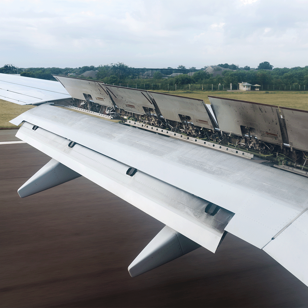 moving parts of an airplane wing