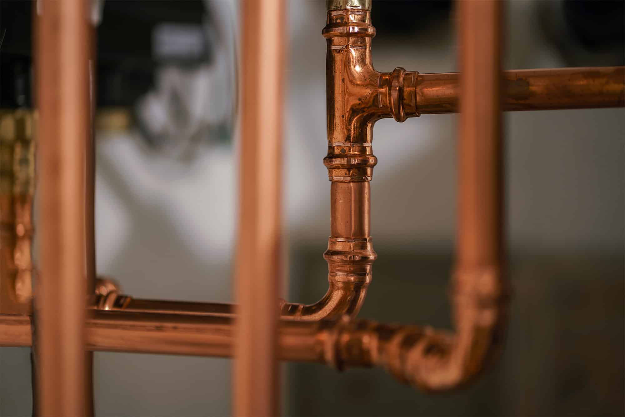 Copper pipes, showing an example of substrate compatibility by showing a substrate that could be coated