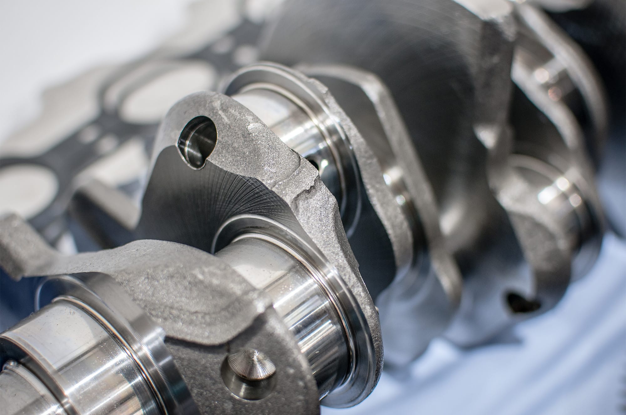 A crankshaft, common in engines, made from carbon steel