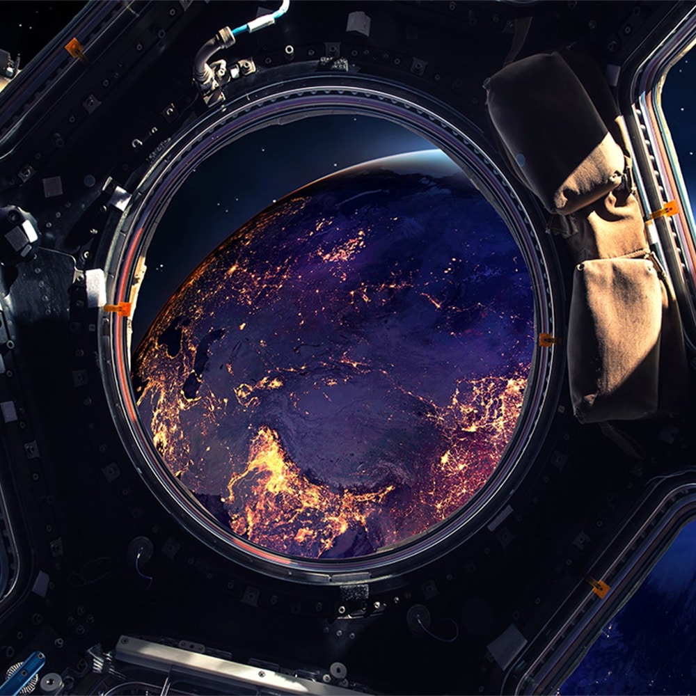 aerospace spacecraft in space overlooking Earth
